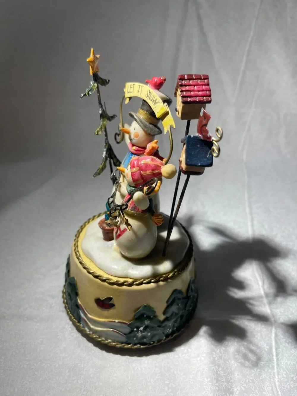 Snowman musical figurine. Plays Joy to the World (109)